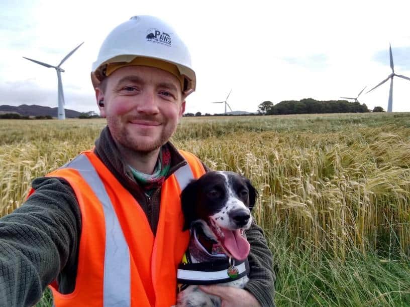 Conservation detection dog team in the field